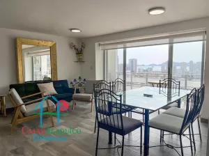 Departamento en piso alto con terraza y vista a la ciudad